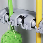 Picture of Wall Mounted Magic Holder Organizer for Broom and Mop with 4 Slot 5 Hook