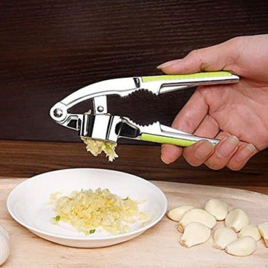 Picture of New Steel Garlic Press With Yellow Handle