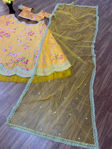 Picture of Yellow Colour Dulhan Lehenga Choli For Wedding With Heavy Embroidery, Butterfly Net & Fancy Border Work