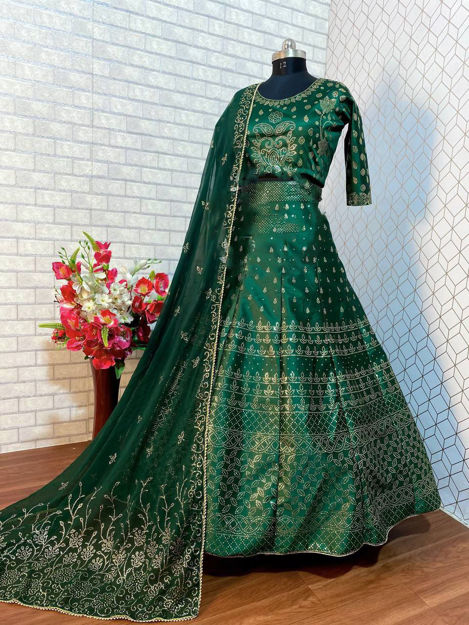 Picture of Green Colored Dulhan Lehenga Choli For Wedding With Heavy Embroidery, Butterfly Net & Fancy Border Work