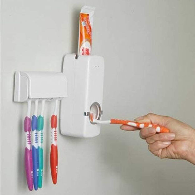 Picture of Toothpaste Dispenser And Tooth Brush Holder For Home Bathroom